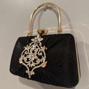 Elegant Black Evening Bag with Gold Accents